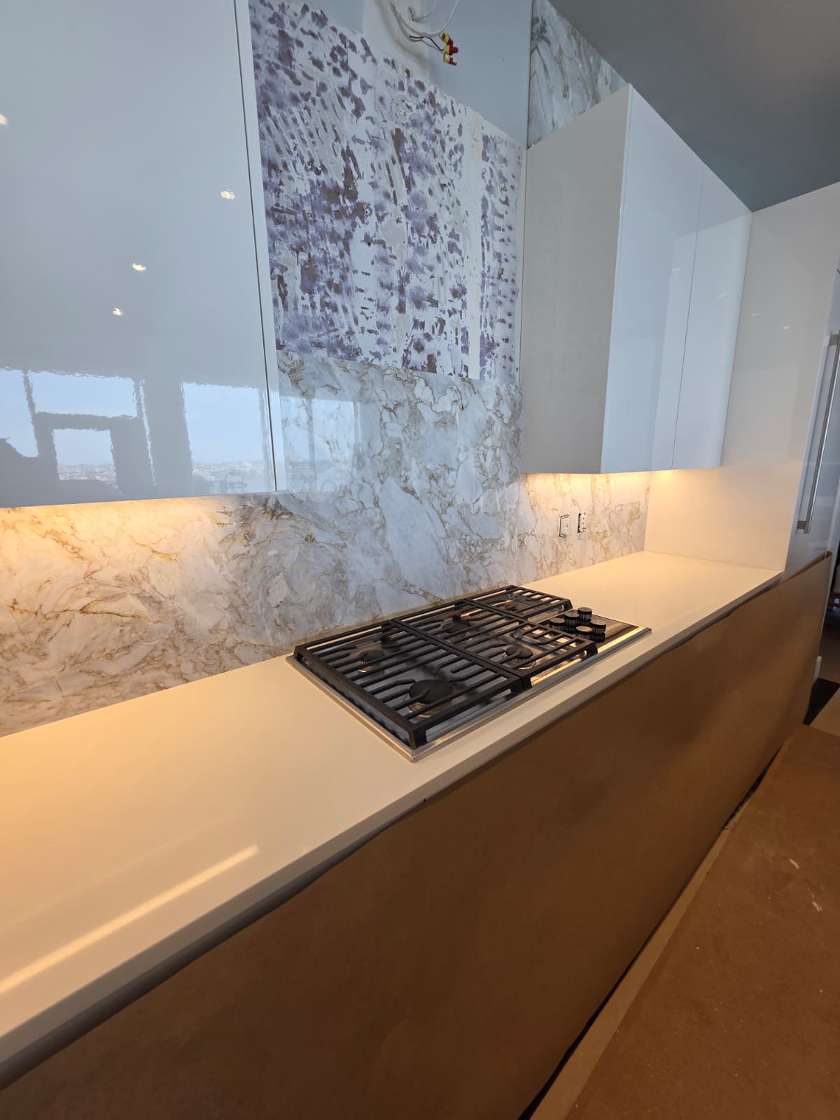 Full-height stone backsplash
